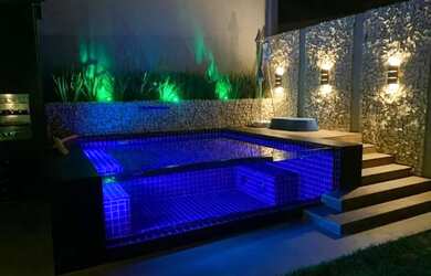 Imagem: A casa possui 5 Dormitórios, 5 Banheiros, 2 Vagas na garagem