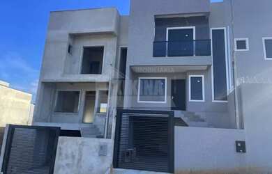 Imagem: A casa possui 3 Dormitórios, 1 Banheiro, 1 Vaga na garagem