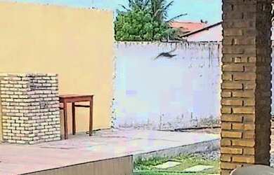 Imagem: A casa possui 2 Dormitórios, Acomodam 12 pessoas, 2 Vagas na