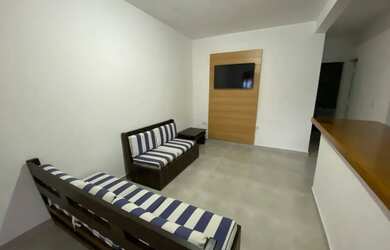 Imagem: A casa possui 2 Dormitórios, Acomodam 6 pessoas, 1 Vaga na