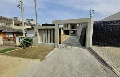 Imagem: A casa possui 3 Dormitórios, 2 Banheiros, 3 Vagas na garagem