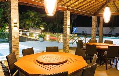 Imagem: A casa em condomínio possui 4 Dormitórios, 4 Banheiros, 2