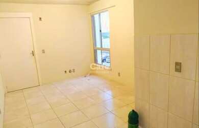 Imagem: O apartamento possui 2 Dormitórios, 1 Banheiro, 1 Vaga na garagem