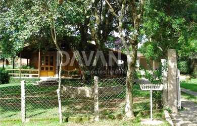 Imagem: A casa em condomínio possui 4 Dormitórios, 3 Banheiros, 200m²