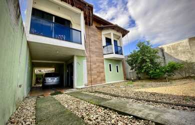 Imagem: A casa e possui 5 Dormitórios, Suítes, 3 Banheiros, 4 Vagas