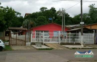 Imagem: A casa possui 5 Dormitórios, 3 Banheiros, 3 Vagas na garagem