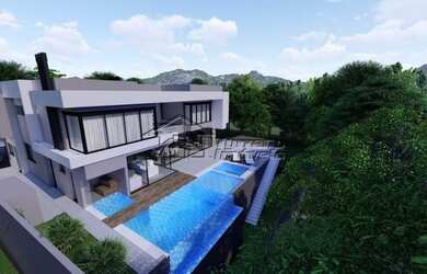 Imagem: A casa em condomínio possui 4 Dormitórios, 5 Banheiros, 3