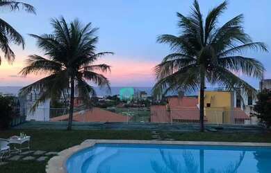 Imagem: A casa possui 5 Dormitórios, 5 Banheiros, 5 Vagas na garagem