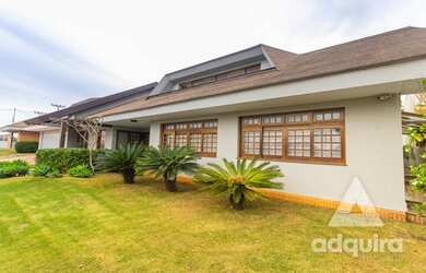 Imagem: A casa possui 4 Dormitórios, 5 Banheiros, 3 Vagas na garagem