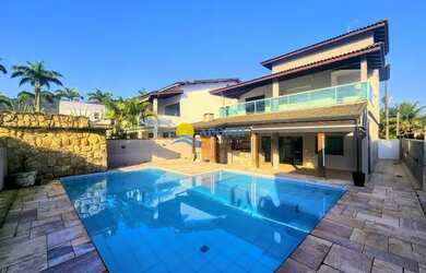 Imagem: A casa em condomínio possui 4 Dormitórios, 5 Banheiros, 4