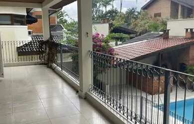 Imagem: A casa em condomínio possui 5 Dormitórios, 5 Banheiros, 5