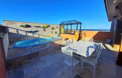 Imagem: A casa possui 4 Dormitórios, 4 Banheiros, 2 Vagas na garagem