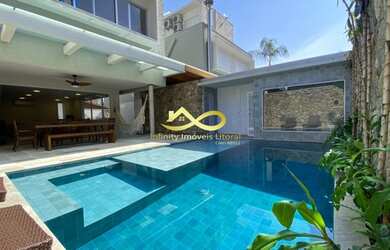 Imagem: A casa em condomínio possui 5 Dormitórios, 5 Banheiros, 2