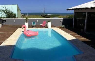 Imagem 2: Casa com piscina na Praia do Ervino locação temporada 1.200,00 diária,70...