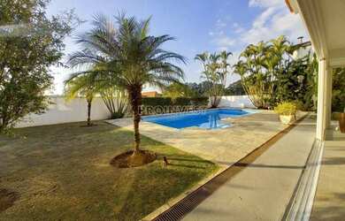 Imagem: A casa possui 5 Dormitórios, 4 Banheiros, 5 Vagas na garagem