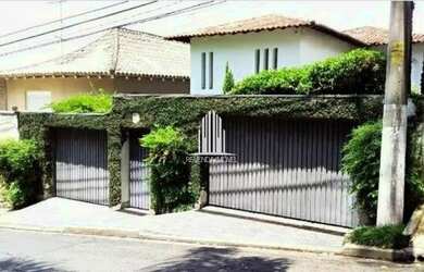 Imagem: A casa possui 3 Dormitórios, 5 Banheiros, 2 Vagas na garagem