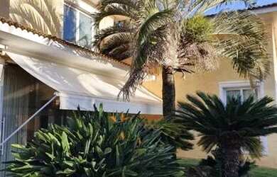 Imagem: A casa em condomínio possui 4 Dormitórios, 5 Banheiros, 4