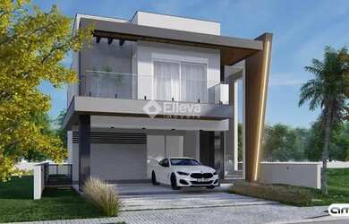 Imagem: A casa possui 4 Dormitórios, 5 Banheiros, 2 Vagas na garagem