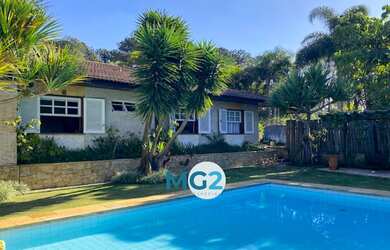 Imagem: A casa possui 5 Dormitórios, 5 Banheiros, 5 Vagas na garagem