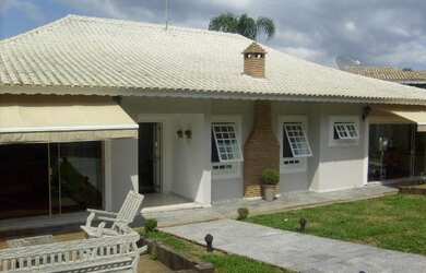 Imagem: A casa em condomínio possui 5 Dormitórios, 5 Banheiros, 3