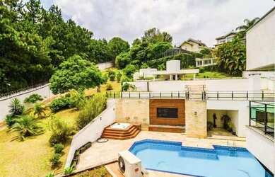 Imagem: A casa em condomínio possui 4 Dormitórios, 5 Banheiros, 5