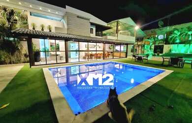 Imagem: A casa possui 5 Dormitórios, 5 Banheiros, 5 Vagas na garagem