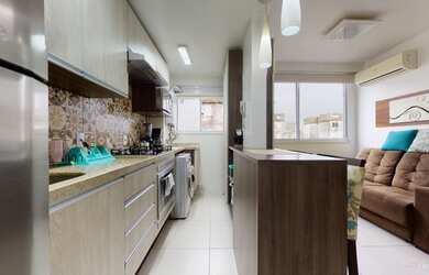 Imagem: O apartamento possui 2 Dormitórios, 1 Banheiro, 1 Vaga na garagem