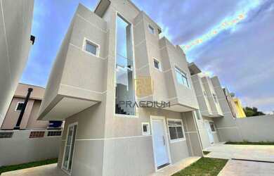 Imagem: A casa possui 3 Dormitórios, 5 Banheiros, 2 Vagas na garagem