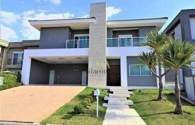 Imagem: A casa possui 4 Dormitórios, 5 Banheiros, 5 Vagas na garagem