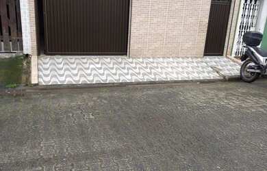 Imagem: A casa possui 2 Dormitórios, 1 Banheiro, 1 Vaga na garagem