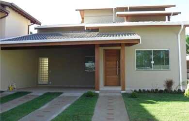 Imagem: A casa possui 3 Dormitórios, 2 Banheiros, 2 Vagas na garagem