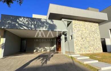 Imagem: A casa em condomínio possui 4 Dormitórios, 5 Banheiros e 210m²