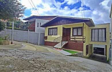 Imagem: A casa possui 2 Dormitórios, 1 Banheiro, 1 Vaga na garagem