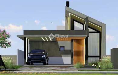 Imagem: A casa possui 3 Dormitórios, 2 Banheiros, 2 Vagas na garagem