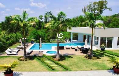 Imagem: A casa em condomínio possui 5 Dormitórios, 5 Banheiros, 5