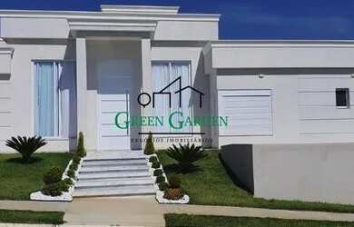 Imagem: A casa possui 3 Dormitórios, 5 Banheiros, 4 Vagas na garagem