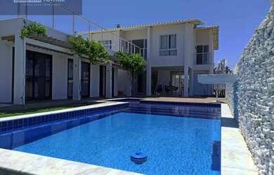 Imagem: A casa possui 5 Dormitórios, 5 Banheiros, 5 Vagas na garagem