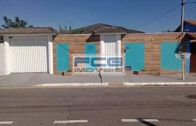 Imagem: A casa possui 2 Dormitórios, 3 Banheiros, 2 Vagas na garagem