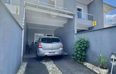 Imagem: A casa possui 2 Dormitórios, 2 Banheiros, 1 Vaga na garagem
