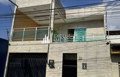 Imagem: A casa possui 3 Dormitórios, 3 Banheiros, 2 Vagas na garagem