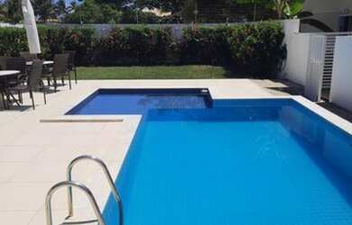 Imagem: A casa em condomínio possui 4 Dormitórios, 4 Banheiros, 2