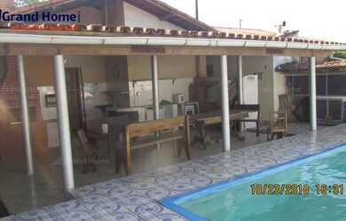 Imagem: A casa possui 5 Dormitórios, 3 Banheiros, 4 Vagas na garagem