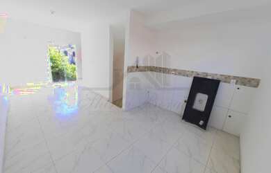 Imagem: A casa possui 2 Dormitórios, 2 Banheiros, 1 Vaga na garagem