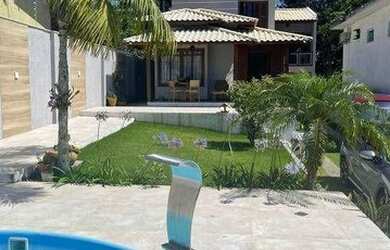 Imagem: A casa possui 3 Dormitórios, 3 Banheiros, 4 Vagas na garagem