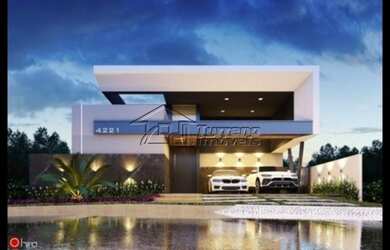 Imagem: A casa em condomínio possui 4 Dormitórios, 5 Banheiros, 2