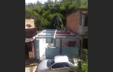 Imagem: A casa possui 3 Dormitórios, 1 Banheiro, 1 Vaga na garagem