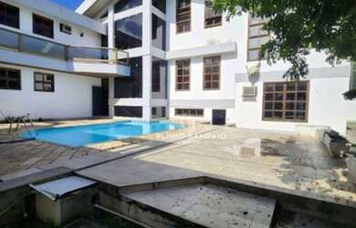 Imagem: A casa em condomínio possui 5 Dormitórios, 5 Banheiros, 4