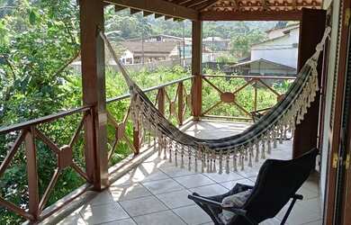 Imagem: A casa possui 4 Dormitórios, 5 Banheiros, 3 Vagas na garagem