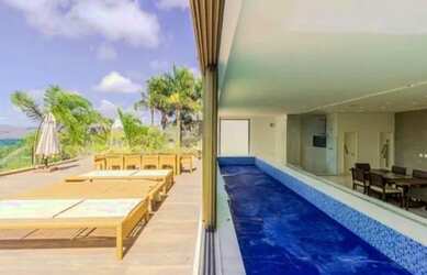 Imagem: A casa possui 5 Dormitórios, 5 Banheiros, 5 Vagas na garagem