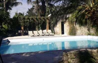 Imagem: A casa em condomínio possui 4 Dormitórios, 5 Banheiros, 5